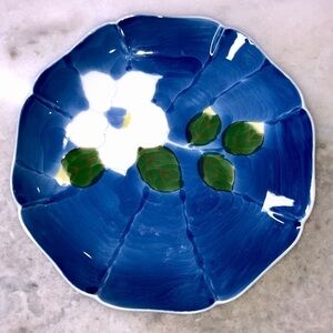 Japanese blue scalloped porcelain plate with white flower